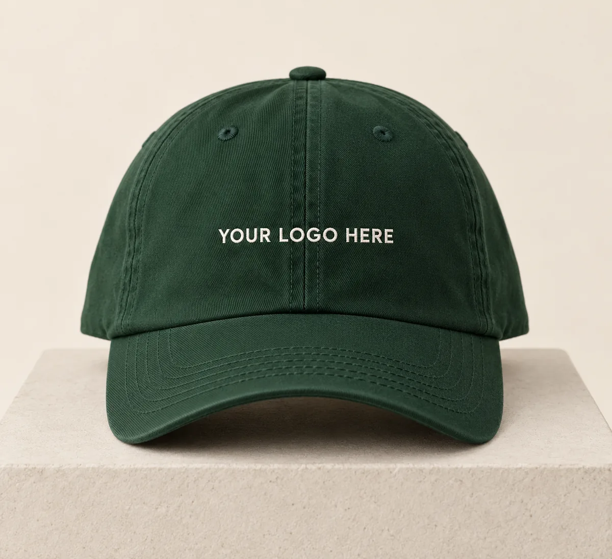 Forest-green cap with embroidered logo placement